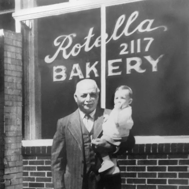 Allessandro-holding-Lou-Jr_2 Rotella's Italian Bakery at Pierce Street location